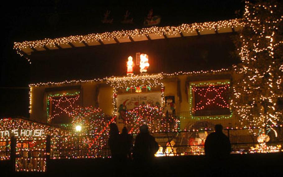 Italians have come from across the country to check out the Davis' home. The lights are to stay on through Jan. 13.