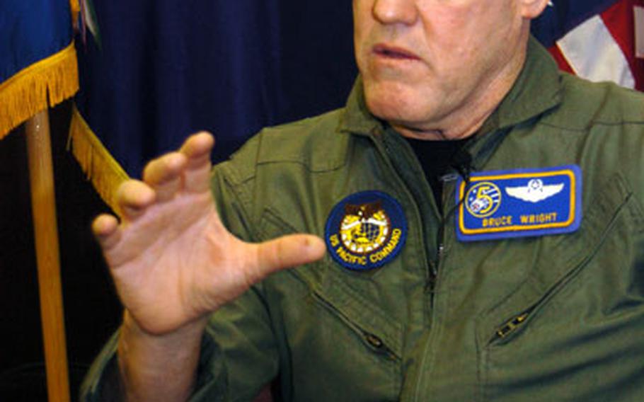Lt. Gen. Bruce Wright, commander of U.S. Forces Japan and the 5th Air Force, talks Monday about the strengthening relationship between the U.S. and Japanese militaries. Wright said exercises such as Keen Sword and Keen Edge have made the two militaries much more interoperable than in the past.
