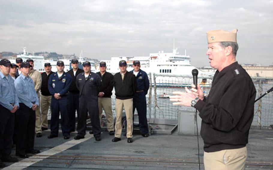Adm. Mark Fitzgerald, commander, Naval Forces Europe, addresses the crew of USS San Jacinto on Wednesday.The Norfolk-based guided missile cruiser was in Naples, Italy, during a routine port visit.