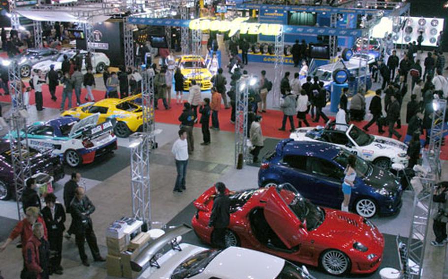 Tokyo Auto Salon 2008, the world’s largest custom car show, was held over the weekend at the Makuhari Messe convention center near Tokyo. The show featured booths set up by more than 300 aftermarket parts manufacturers, custom car shops and auto makers.