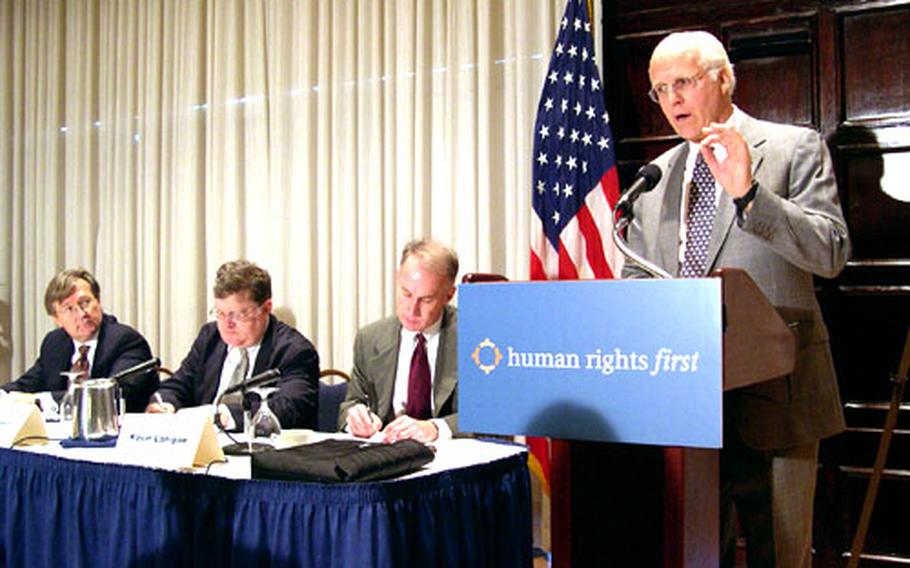 Rep. Christopher Shays, R-Conn., (right) talks about his concerns on lax oversight of contractors in Iraq and Afghanistan during Wednesday’s unveiling of a new Human Rights Watch report on the issue. Seated from left to right are retired Rear Adm. John D. Hutson, former Navy Judge Advocate General; Scott Horton, anti-war activist and international law expert; and Kevin Lanigan, director of Human Rights First’s law and security program.