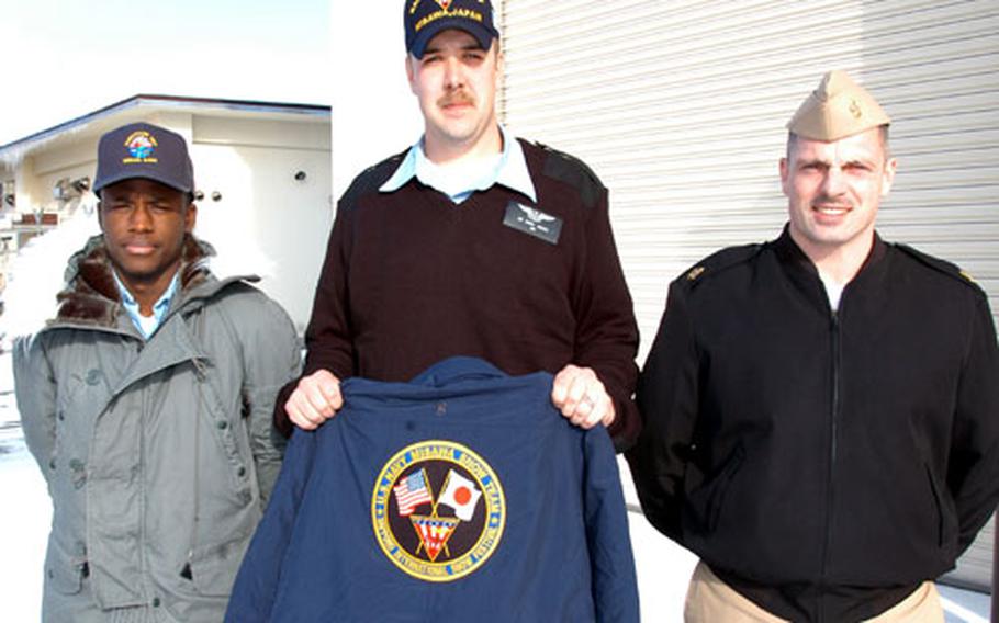 From left, Petty Officer 2nd Class Quintron Perry, Petty Officer 1st Class Aaron Walrod and Chief Petty Officer Eric Holewinski are three of seven team members from Misawa who will carve a snow sculpture for display at the Sapporo International Snow Festival in February. The U.S. team from Yokota Air Base, Japan, will be competing in the international snow carving competition. The Sapporo snow festival runs from Feb. 5 to 11 on Japan's northern island of Hokkaido.