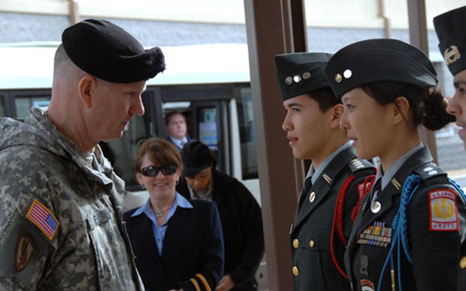 U.S. Forces Korea commander Gen. B.B. Bell talks with Daegu American JROTC students on Thursday during a visit to Camp Walker and Camp Henry.