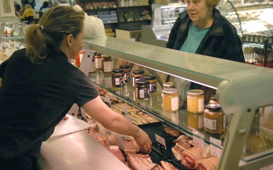 Thetford resident Jan Randall orders meat at Elveden Estate’s butcher counter. She said the meat at the Thetford estate is cheaper and much better quality than what’s offered at local supermarkets.