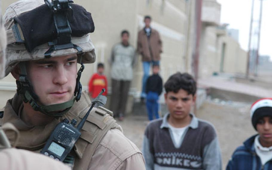 Cpl. Brett Younts, 21, of 3rd Squad, 4th Platoon, Company L, 3rd Battalion, 5th Marines, led a patrol Saturday to find locals they could hire to clean up a trash-strewn part of their area in Fallujah. With a vast reduction of violence here in the past six months, such missions are commonplace these days.