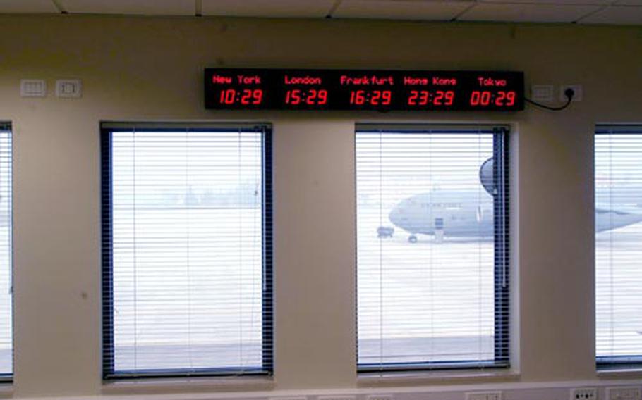 An upstairs office in the new Personnel Alert Holding Area has a good view of the south ramp on base, including one of three C-17s that were parked on the expanse Monday.