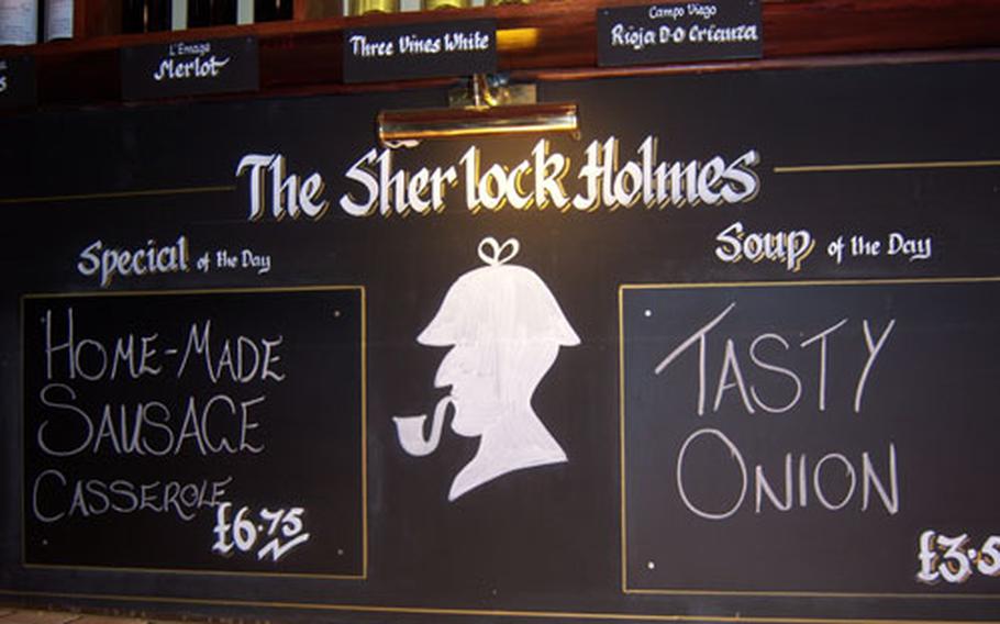 A placard advertises specials at The Sherlock Holmes pub in Westminster.