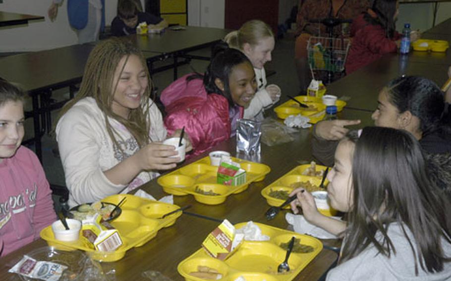 A group of fifth- and sixth-graders gather for lunch at Neubruecke Elementary School. Enrollment is expected to drop from 115 students to 53 next year, according to the DODDS-Europe, and a decision was made to close the school after this school year.