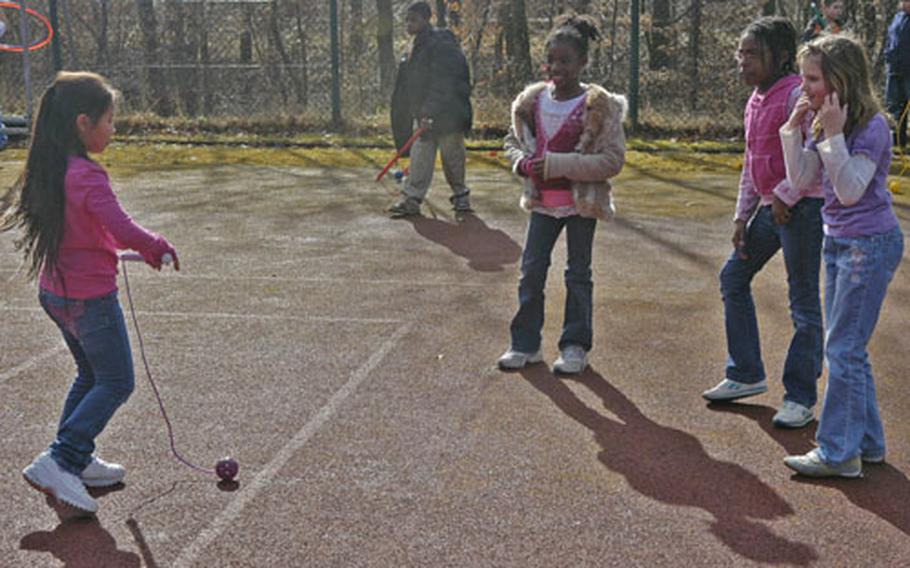 Students play during recess at Neubruecke Elementary School in Baumholder, Germany.