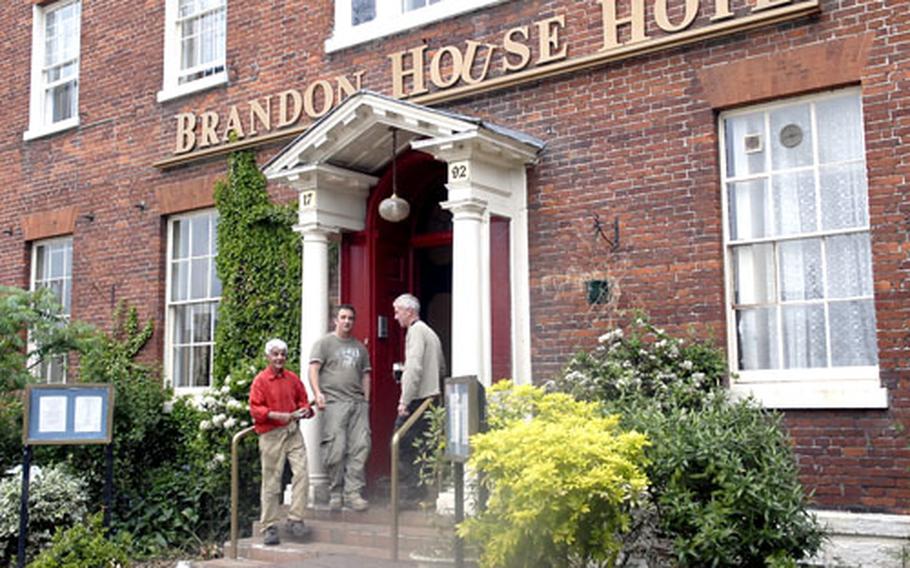 The outside of the Brandon House Hotel is a little overgrown, and the "U" in its sign hangs askew, but the imperfections only add to its charm.