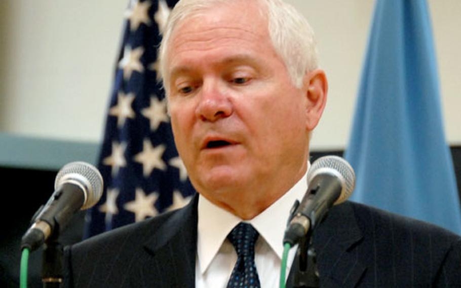 Secretary of Defense Robert Gates speaks Tuesday at a news conference at U.S. Army Garrison-Yongsan, following the change of command ceremony for Gen. B.B. Bell and Gen. Walter Sharp.