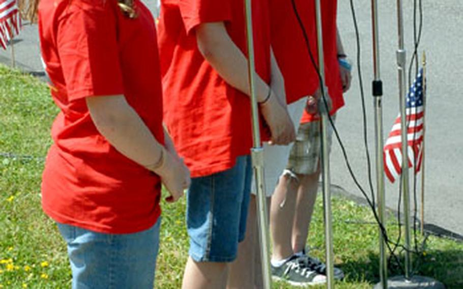 Students from Würzburg American Elementary / Middle School sing "When It&#39;s Time To Say Goodbye" during the school&#39;s closing ceremony Friday on Leighton Barracks.
