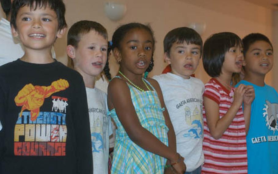 Students at Gaeta Elementary School perform for parents and faculty Friday as they celebrated the final day of the school year and marked the closing of the school for good.