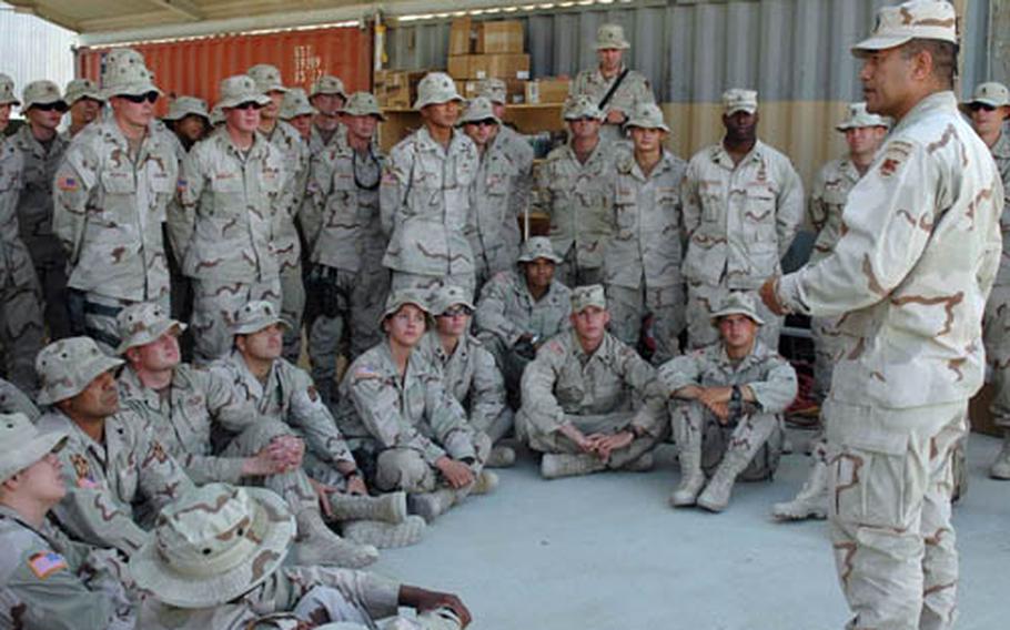 Command Sgt. Maj. Iuniasolua Savusa, then Combined Joint Task Force-76 command sergeant major, talks with Italy-based soldiers from the 13th Military Police Company during their 2006 deployment to Kandahar, Afghanistan. Savusa will soon leave his job at U.S. Army Europe command sergeant major to take the top enlisted spot for NATO forces in Afghanistan.