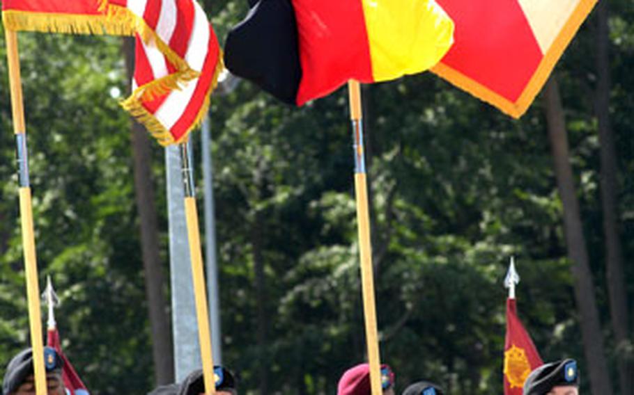 An Army color guard displays the flags of the U.S., Germany and 29th Support Group during the group's deactivation ceremony on Monday at Rhine Ordnance Barracks in Kaiserslautern, Germany.