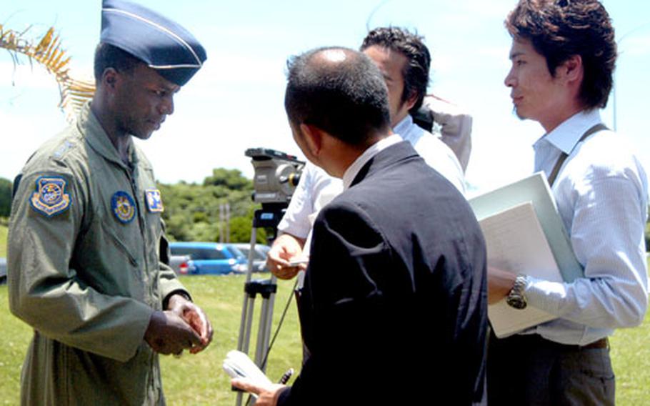 Air Force Lt. Gen. Edward Rice, U.S. Forces Japan commander, takes questions from Japanese reporters during a visit at Kadena Air Base, Okinawa, on Friday.