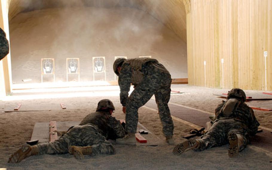 Soldiers from 1st Battalion, 10th Special Forces Group shoot at targets at one of the firing ranges next to Panzer Casern in Böblingen, Germany.
