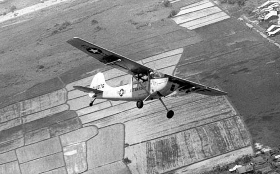 A Forward Air Controller gains altitude after a low-level flight over his sector in Vietnam.