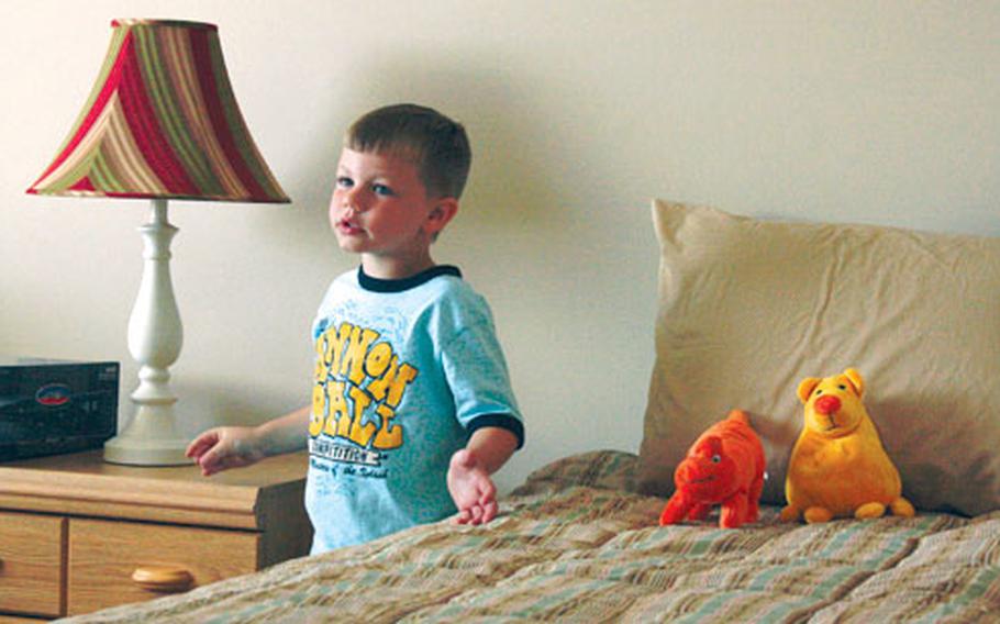 Christopher Payne Jr., 5-year-old son of wounded Army Staff Sgt. Chris Payne, shows off his new bedroom to reporters on Tuesday. The apartment is one of 15 being furnished by Operation Homefront to families of rehabbing soldiers at Walter Reed Army Medical Center, in order to give them more independence and privacy.
