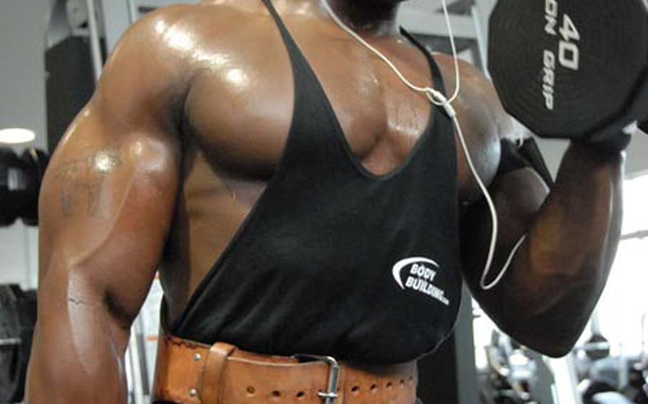 Petty Officer Second Class Akaiya "The Beast" Miller trains at the Sasebo Naval Base fitness center Thursday.
