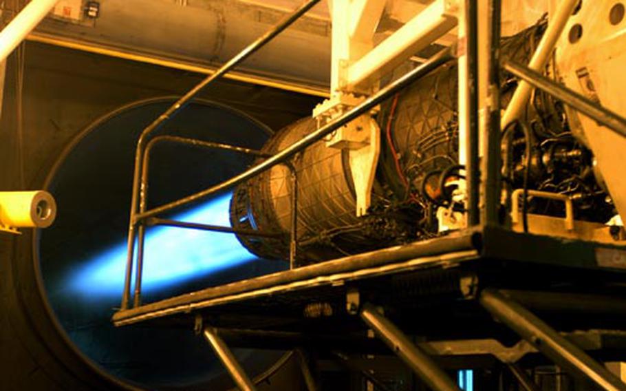 The afterburners of an F-15E Strike Eagle engine spit into a tunnel while being inspected at a test-run facility last week. Each month, more than 30 engines are inspected at three test-run facilities at RAF Lakenheath.