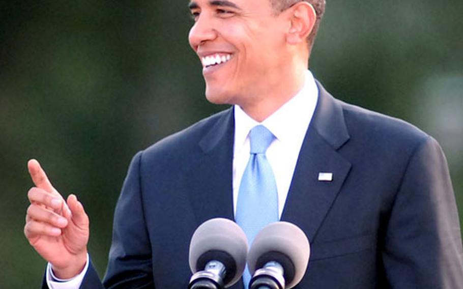 Sen. Barack Obama talks to an international crowd in front of the Victory Column in Berlin on Thursday night.