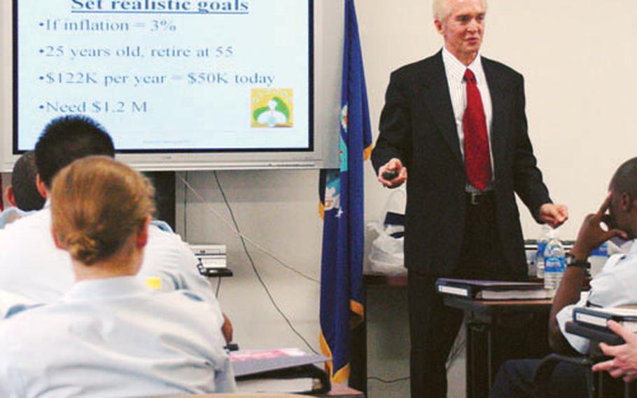 James McDaniel, a community readiness technician with Yokota’s Airmen and Family Readiness Center, teaches a Personal Financial Fitness class to first-term airmen.