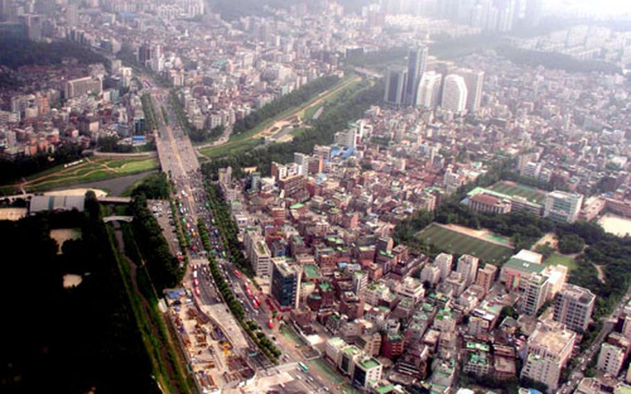 Morning rush hour traffic on the streets of Seoul, as seen from the window of a U.S. Army Black Hawk helicopter.