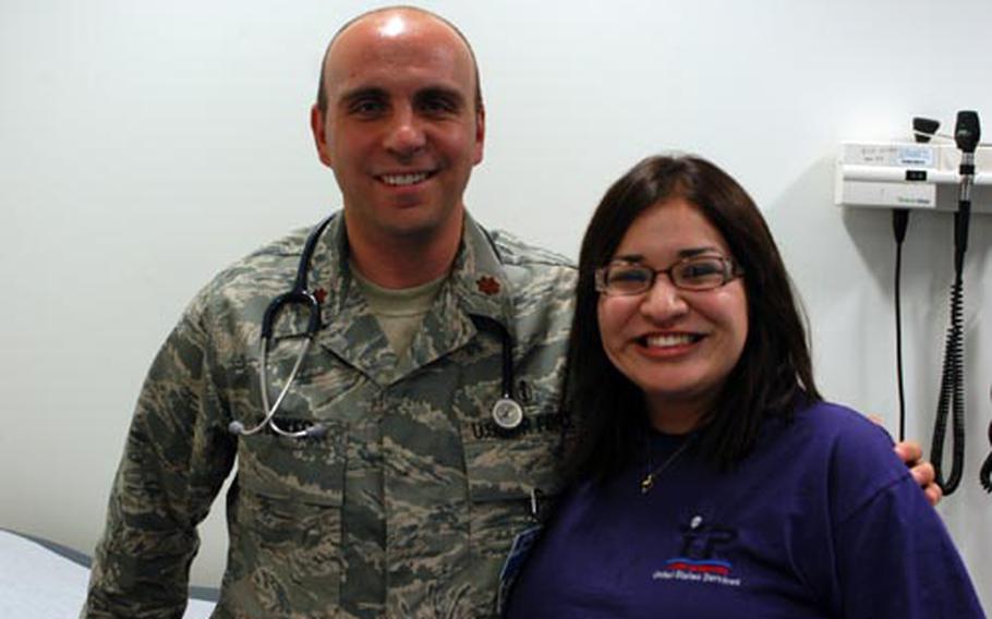 Brittny Cantero and Dr. (Maj.) Shayne Stokes pose for a picture at Lakenheath hospital on Cantero’s last day at the site. She was one of four National Youth of the Year ambassadors for the Boys & Girls Clubs of America who spent the summer at U.S. military installations around Europe. Along with working with children at the youth center, Cantero, who wants to be a pediatrician, was also able to do some job shadowing at the hospital.