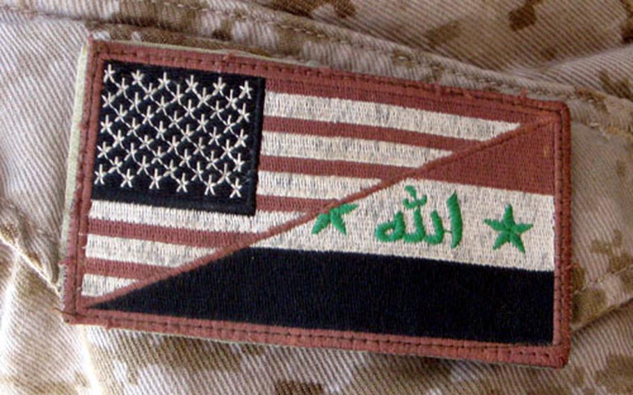 Some Marines with military transition teams assigned to 2nd Quick Reaction Force, 1st Iraqi Division, wear this patch on their uniforms to show the partnership they have with the Iraqi units they advise.