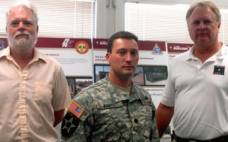 U.S. Army Europe science advisers Richard Helfman and Lt. Col. Kevin Vanyo, and V Corps science adviser Kelly McGuire.