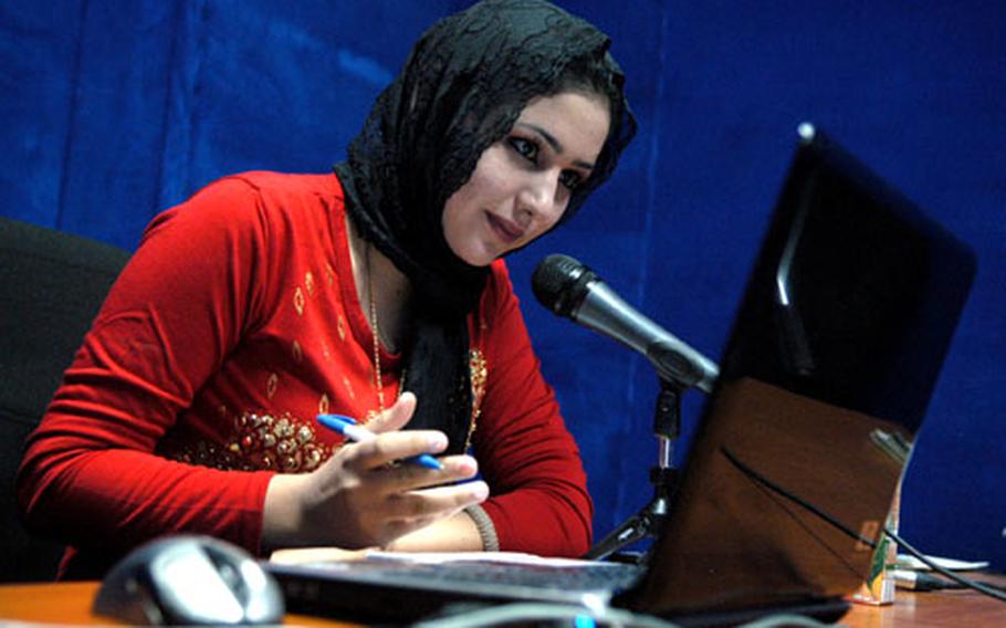 Donia Abid Latief speaks to a caller during her weekly radio show called "Doves of Peace."