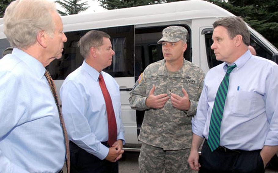 Brig. Gen. Jon Miller, head of a European Command team in Tbilisi, Georgia, speaks with (left to right) Sens. Joe Lieberman and Lindsey Graham and Rep. Chris Smith in Tblisi, Georgia.