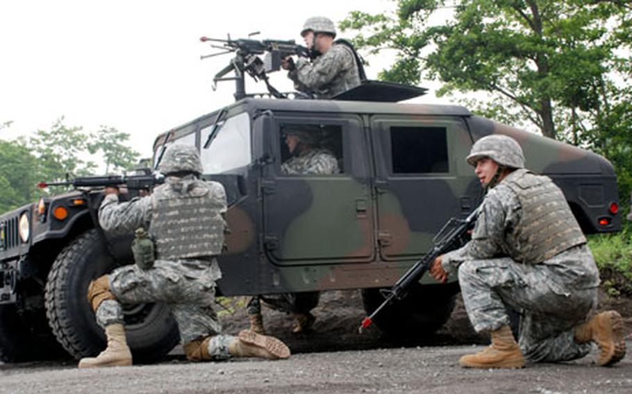 Members of the 623rd Movement Control Team of the 35th Combat Sustainment Support Battalion conduct convoy operations training at Camp Fuji in preperation for deployment to Kuwait.