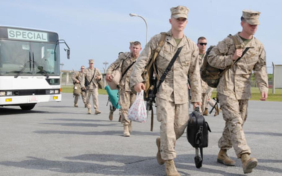 About 75 servicemembers from 3rd Marine Division, most with Camp Schwab’s Combat Assualt Battalion, arrive Friday at Kadena
Air Base, Okinawa, after a seven-month deployment to Anbar province, Iraq.