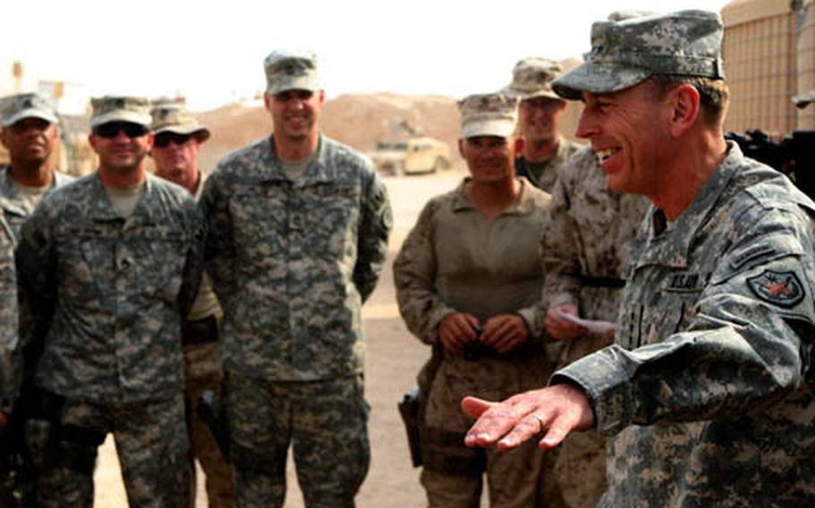 Gen. David Petraeus, who hands over command of Multi-National Force-Iraq on Tuesday, speaks to U.S. servicemembers at Camp Gannon, Iraq, near the Syrian border, last week. Petraeus will face a broad set of regional challenges in his next post at U.S. Central Command.