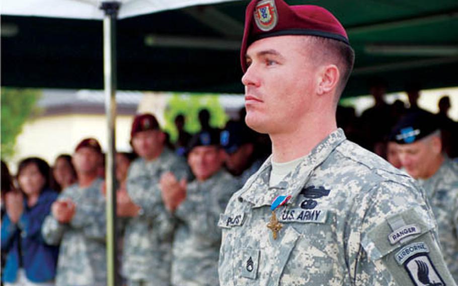 Staff Sgt. Erich R. Phillips, Mortar Platoon Sergeant for Chosen Company, 2nd Battalion, 503rd Infantry Regiment (Airborne), was awarded the Distinguished Service Cross Sept. 15, 2008 in Vicenza, Italy, for his actions at Ranch House in Nuristan Province, Afghanistan Aug. 22, 2007.