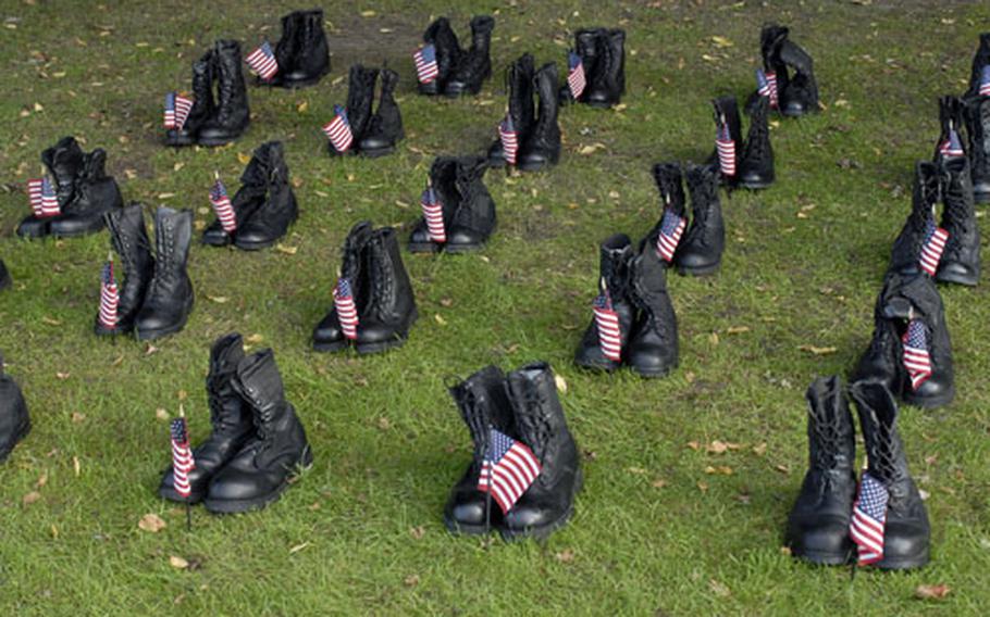 Empty boots with U.S. flags were used to symbolize prisoners of war and the missing in action during a 24-hour vigil for RAF Mildenhall’s POW/MIA Remembrance Week.