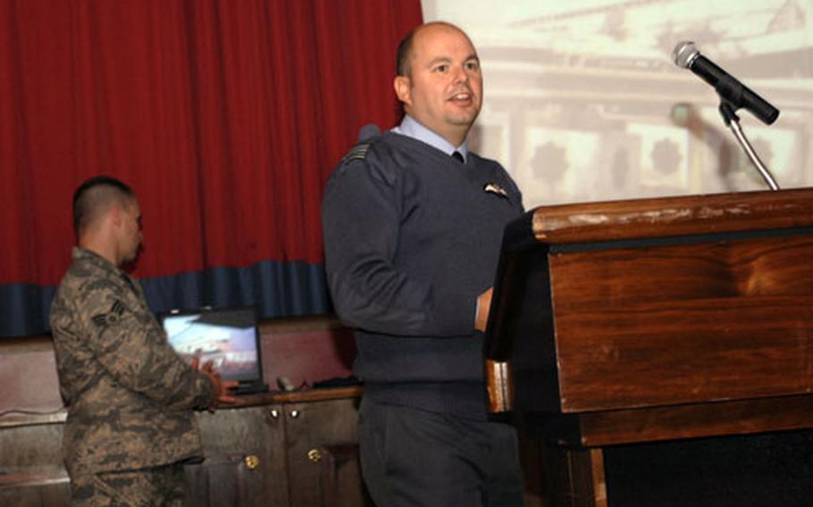 Royal Air Force Wing Cmdr. Dave Waddington, of the IX (B) Squadron at RAF Marham, discusses his experiences as a prisoner of war in Iraq during Operation Desert Storm in 1991. Waddington told a packed house at a POW/MIA Remembrance Week luncheon at RAF Mildenhall that the ordeal reinforced the importance of family and friends.