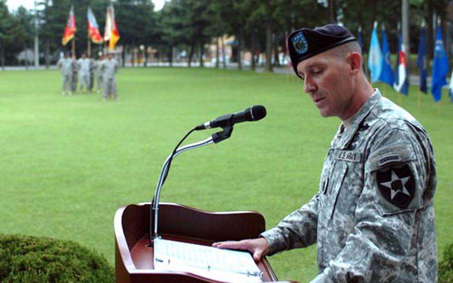 Command Sgt. Maj. Brian Stall speaks during a ceremony relieving him of responsibility for the 2nd Infantry Division on Monday. Stall moves on to Fort Jackson, S.C., where he will be the top enlisted man at a base responsible for training.