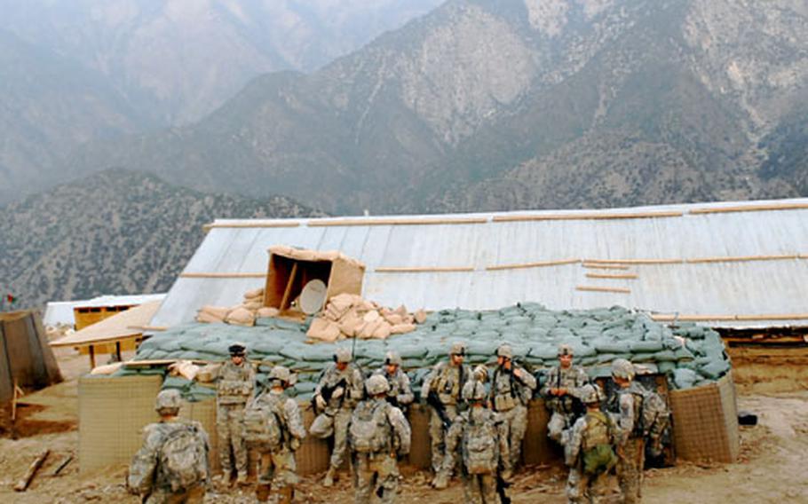 Soldiers from 1st Platoon, Troop C, 6th Squadron, 4th Cavalry Regiment prepare for a patrol at Combat Outpost Lybert in northeastern Afghanistan. The platoon was sent in to reinforce the outpost after it was attacked on Sept. 11, killing one soldier.