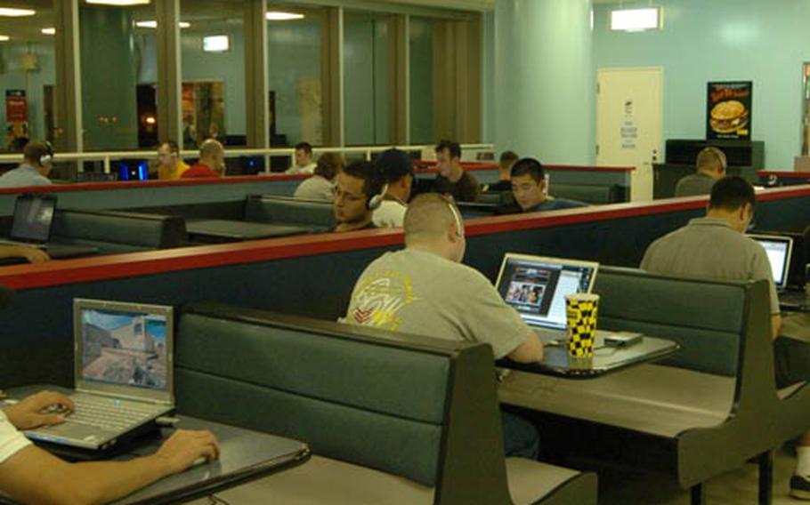 Upon their Thursday arrival in Japan, many USS George Washington sailors surf the Web at Yokosuka's Fleet Recreation Center rather than venture off base.