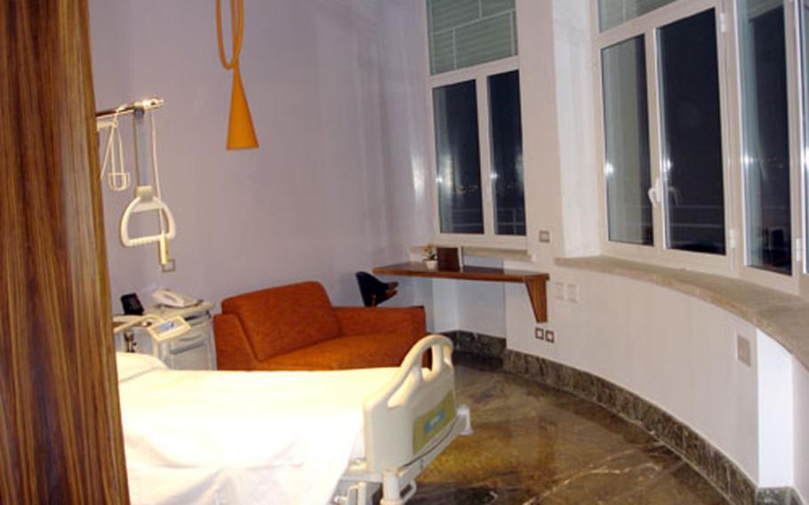 Private rooms in the newly renovated wing of Clinica Mediterranea, a local hospital used by the U.S. Navy. The rooms also include a private bathroom and flat-screen televisions.