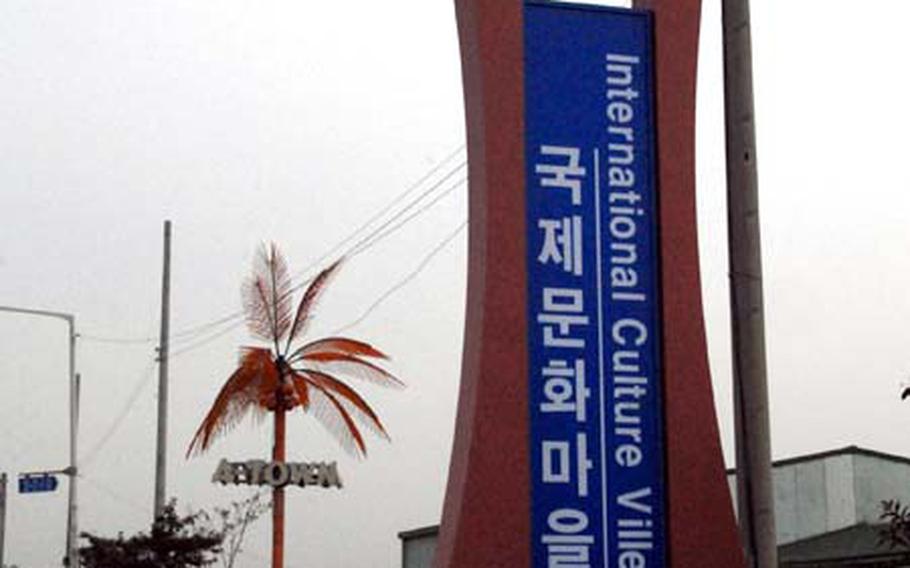 Gunsan City officials put up this sign for "International Culture Ville" in September at the turnoff to A-Town, a restaurant, bar and shopping area near Kunsan Air Base. The base commander said he wanted to change the name A-Town, short for America Town, to be more respectful of the South Korean residents living nearby.