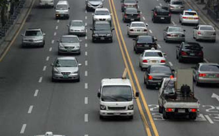 Six lanes of traffic pass between U.S. Army Garrison-Yongsan on the left, and the Crown Hotel on the right. The sidewalk in front of the Crown Hotel was named the noisest spot in Seoul by the Korea Environmental Management Corp.