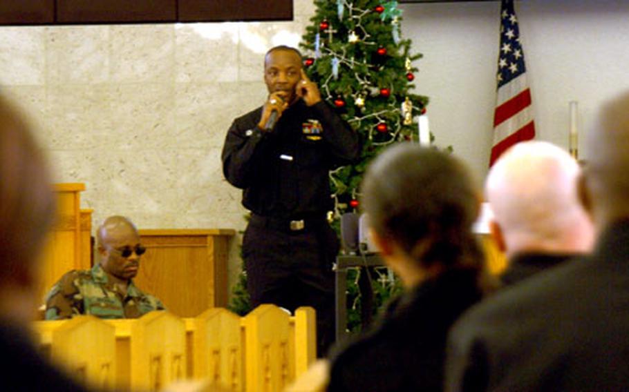 Petty Officer 1st Class Trevor Godwin leads sailors in a drunken-driving discussion the Chapel of Hope during the holiday safety stand-down at Yokosuka Naval Base, Japan, on Wednesday.