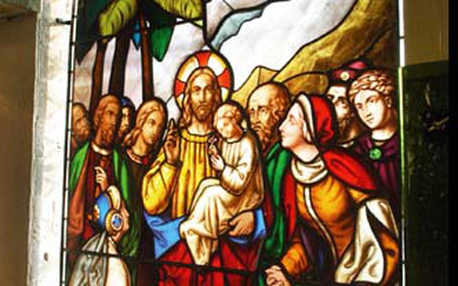 Stained-glass works of art are pretty unremarkable until light is added to the mix, such as with “Christ Blessing the Children,” a 19th-century work on display at The Stained Glass Museum.