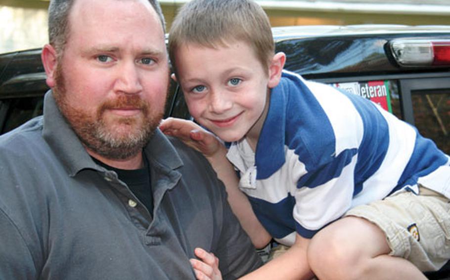 Mike McMichael and son Hunter, 7.