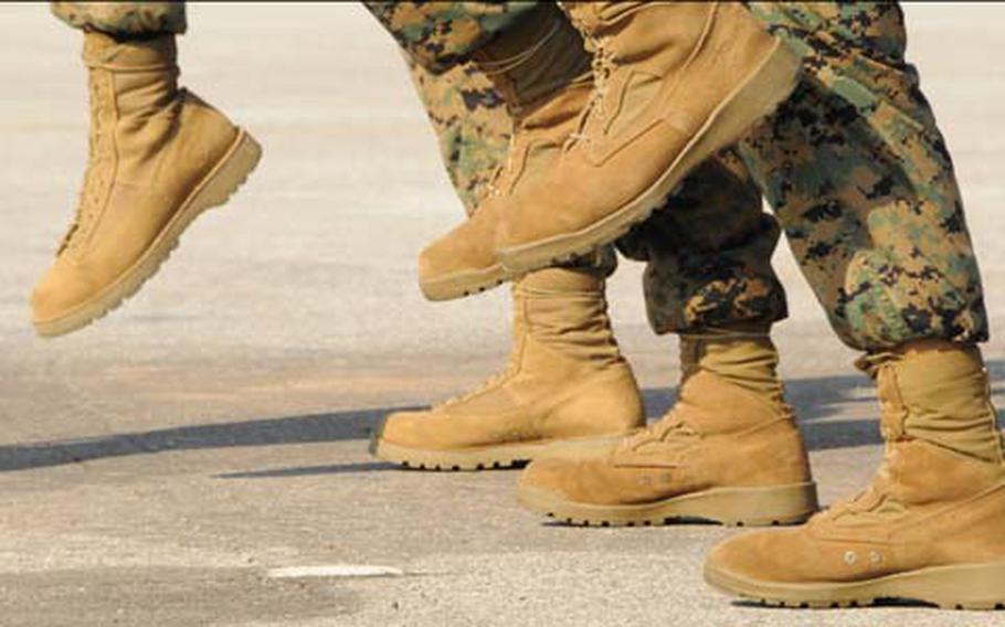 Marines try to move in unison.