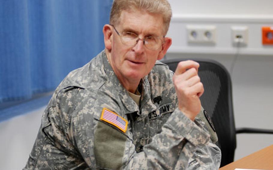 Lt. Gen. Eric Schoomaker, the Army surgeon general, talks with doctors at Landstuhl Regional Medical Center in Germany on Thursday afternoon. Schoomaker visited Army installations in Italy and Germany during his three-day trip.